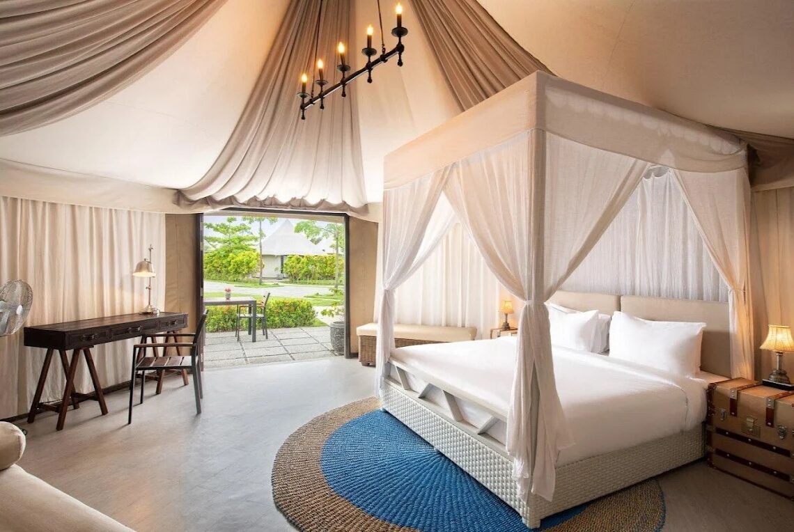 A glamping tent at Natra Bintan overlooking the turquoise Crystal Lagoon.